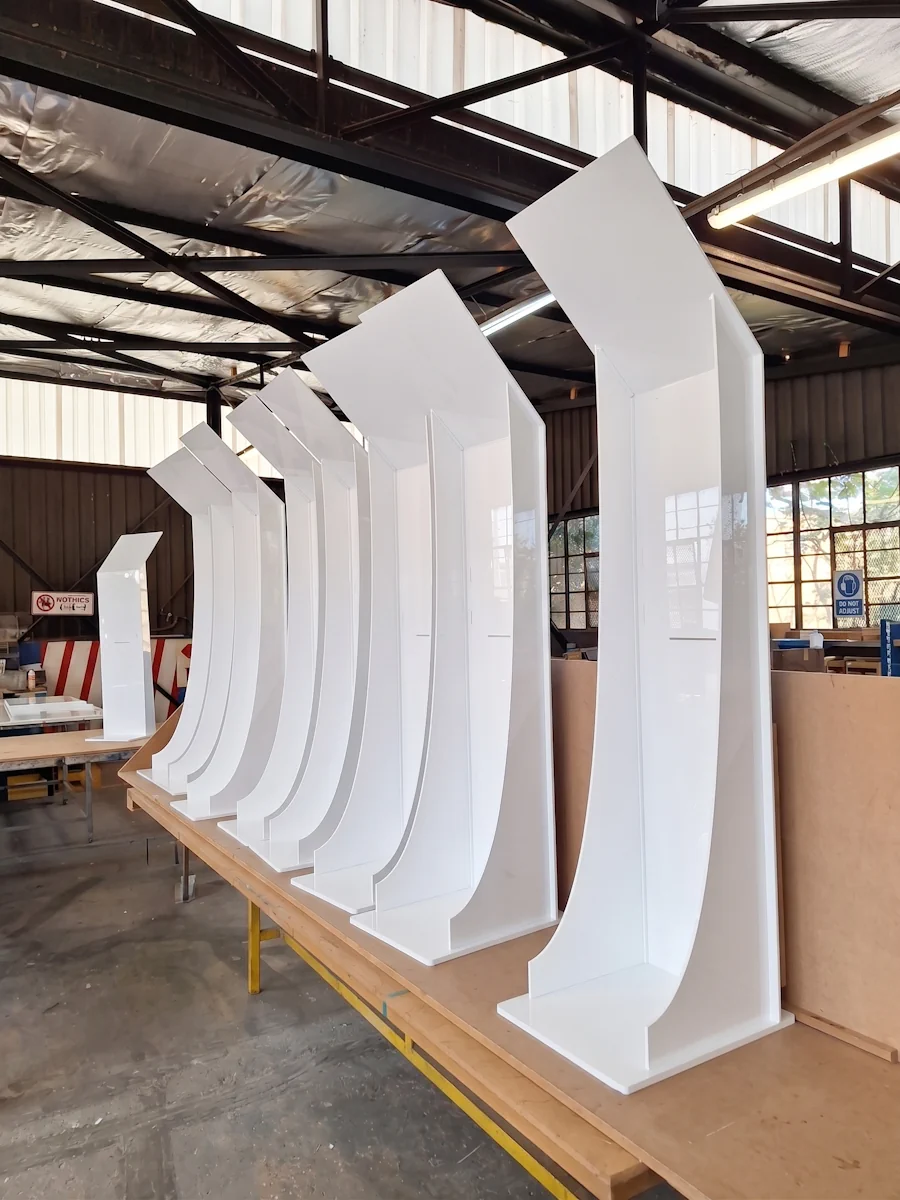 Freestanding display units for a national car dealership rollout — custom FSDU acrylic display stands Johannesburg