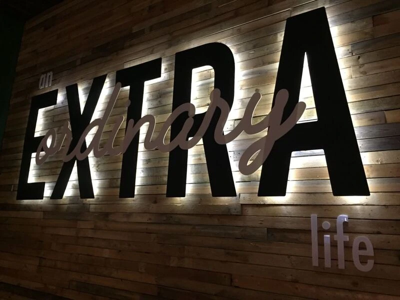 directional acrylic signage for retail floor