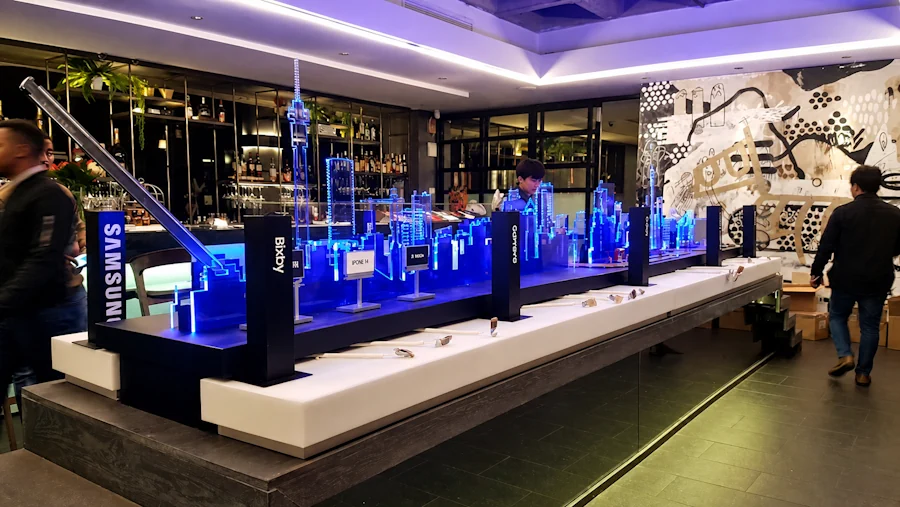 A SPECIAL demo table with illuminated Perspex features, plinths and lightboxes made by moriah plastics
