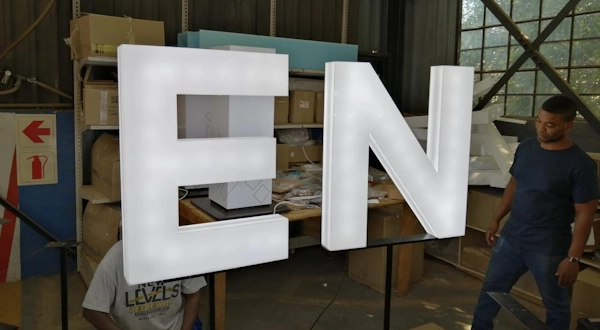 Illuminated acrylic sign and light box face fabricated by Moriah Plastics in Johannesburg