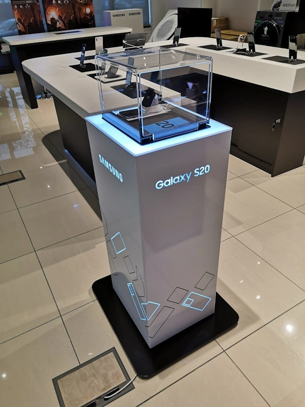 Security‑tethered handset podium with cable routing — electronics display stands Johannesburg
